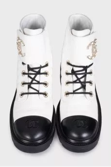 Black and white leather boots