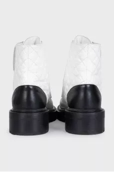 Black and white leather boots
