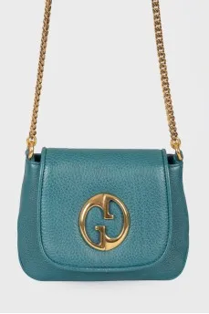 Badge is a leather turquoise