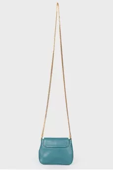 Badge is a leather turquoise