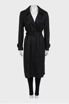 Fitted black coat with a belt