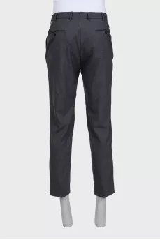 Men's gray wool trousers with a zipper and buttons