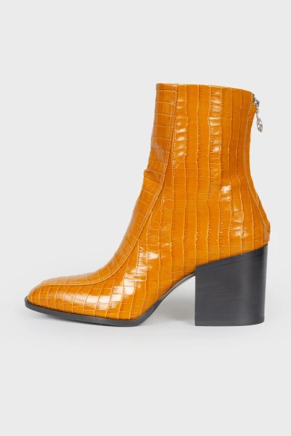 Leather square toe booties with a tag