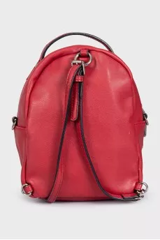 Red leather backpack with decor