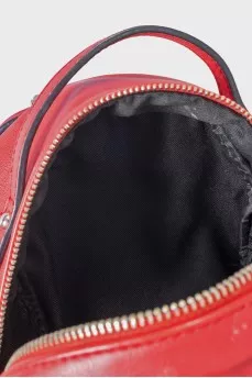 Red leather backpack with decor