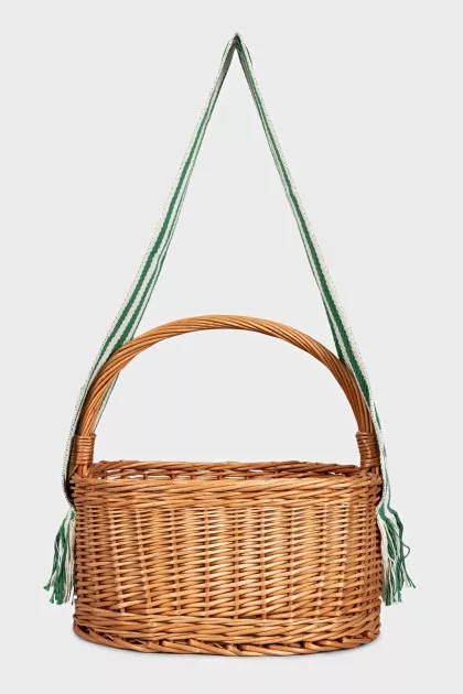 Wicker basket with textile strap