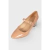 Beige patent silver heel shoes