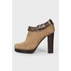 Suede ankle boots with belt buckle