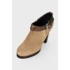 Suede ankle boots with belt buckle