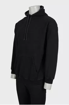 Men's black loose-fitting hoodie with brand logo