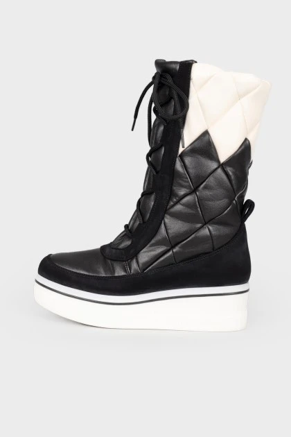 Quilted eco-leather boots with tag