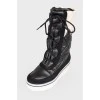 Quilted eco-leather boots with tag