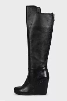 Leather wedge boots with a back zip