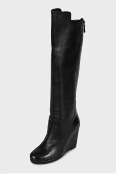 Leather wedge boots with a back zip