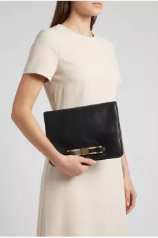 Black leather clutch with a bow