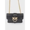 Leather bag with golden fittings