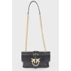 Leather bag with golden fittings
