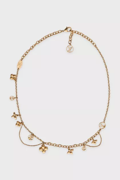 Gold-tone necklace with signature pendants