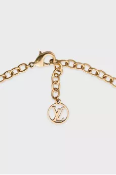 Gold-tone necklace with signature pendants