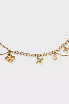 Gold-tone necklace with signature pendants