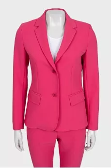 A suit consisting of a fitted jacket and cropped trousers