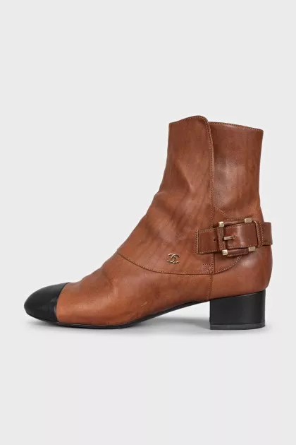 Brown leather ankle boots with black toe