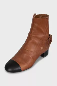 Brown leather ankle boots with black toe