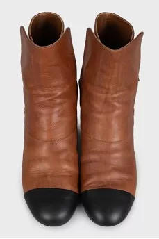 Brown leather ankle boots with black toe