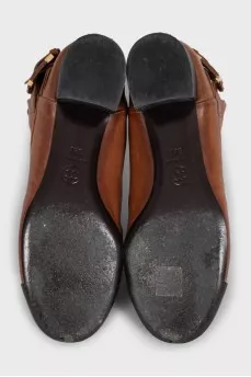 Brown leather ankle boots with black toe