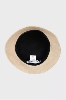 Beige panama hat decorated with a patch