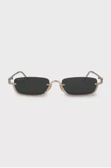 Narrow sunglasses with green tint