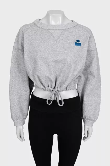 Cropped gray sweatshirt with a patch