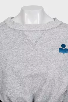 Cropped gray sweatshirt with a patch