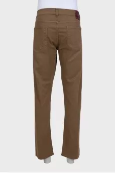 Men's brown straight-leg jeans with tag