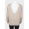 Long open back sweatshirt, with the tag