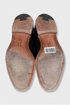 Men's black loafers with buckles
