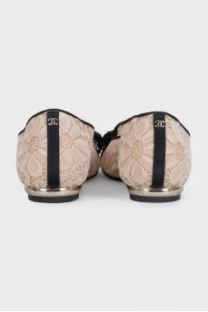 Lace beige ballet flats with a bow
