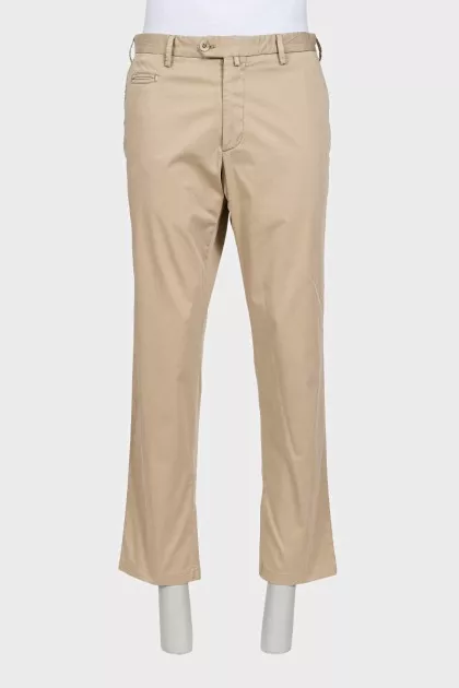 Men's beige trousers with a zipper and buttons
