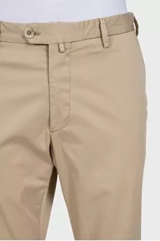 Men's beige trousers with a zipper and buttons