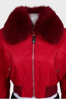 Red fur bomber jacket with tag