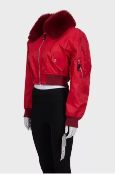 Red fur bomber jacket with tag