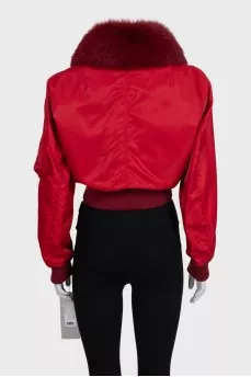 Red fur bomber jacket with tag