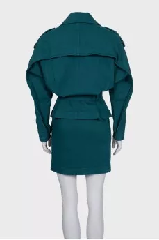 Green denim dress with a gold zipper