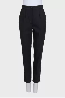 Black straight-leg wool trousers with tag