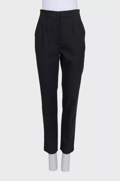Black straight-leg wool trousers with tag