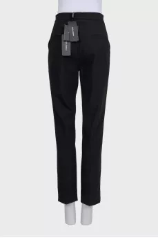 Black straight-leg wool trousers with tag