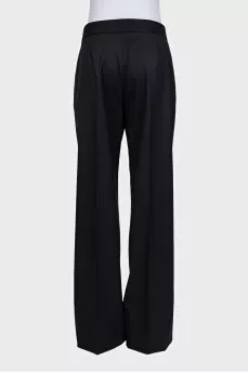 Black wool trousers with tag