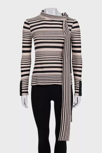 Striped jumper with ties at the neck