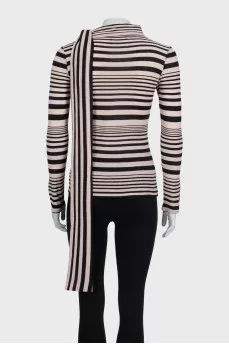 Striped jumper with ties at the neck