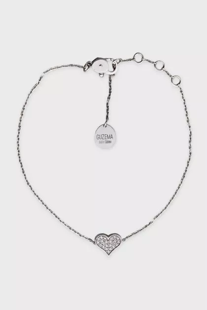 Gold bracelet with a heart decorated with diamonds